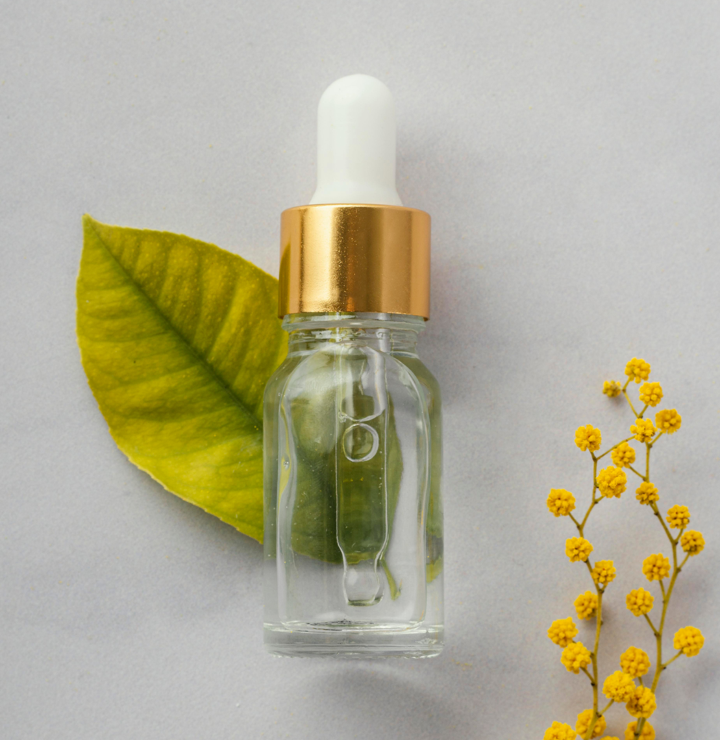 Lumi skincare serum bottle with leaf and flowers